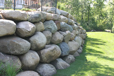 Image: Tier One Landscape boulder retaining wall.