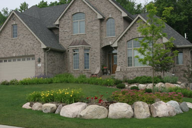 Image: Tier One Landscape boulder work.