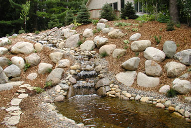 Image: Tier One Landscape boulder work.